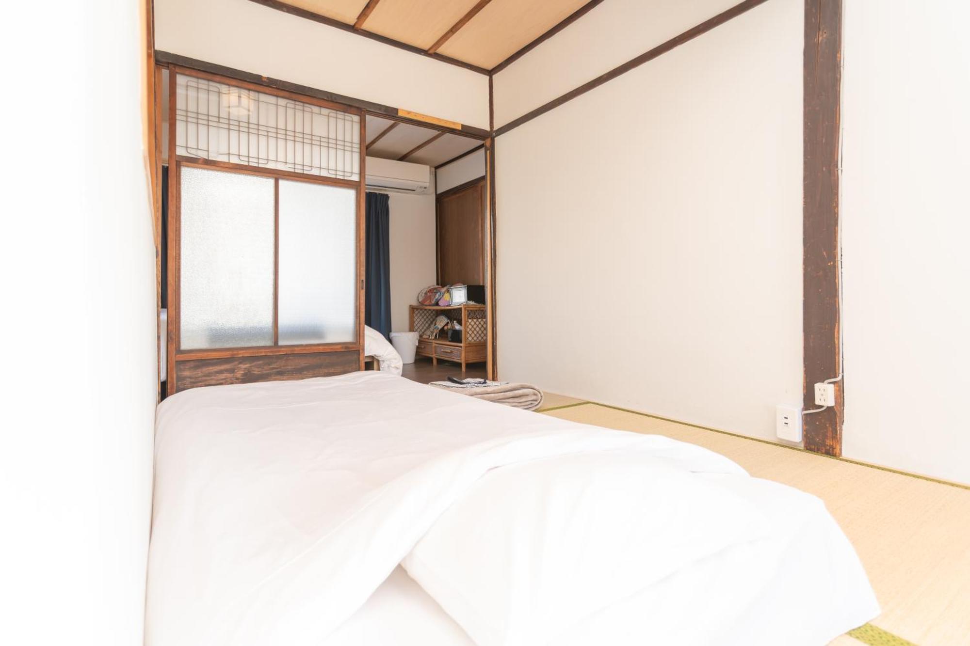 Guesthouse Oneworld Shijo四条京町屋 Киото Екстериор снимка